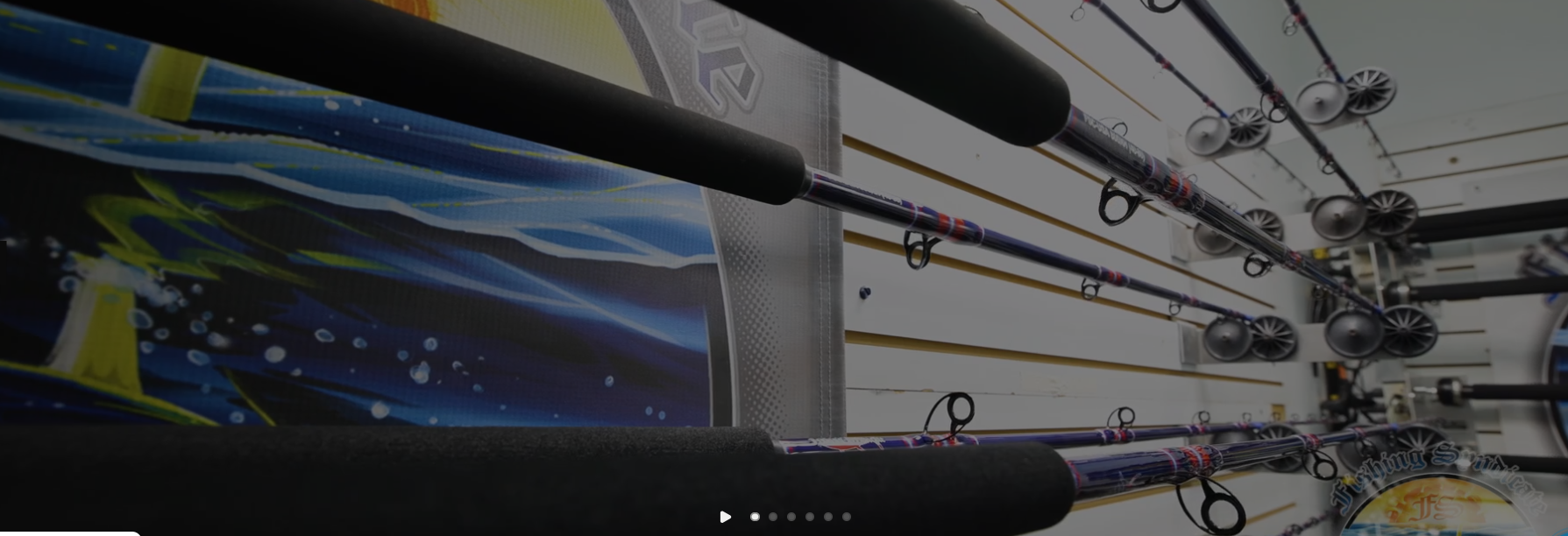Wall of Fishing Syndicate rods rigged and ready at Island Fishing Tackle